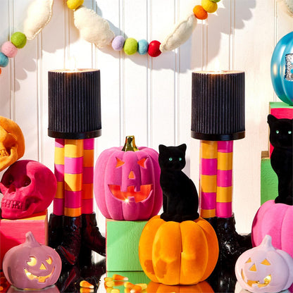 Wicked Witch Candle Holder with black ribbed top and bright striped stems Gia Roma Halloween decor on Tampa Home & Garden Store