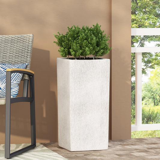 MGO Planter by HouseOfZazla, white textured planter with lush green shrub on Tampa Home & Garden Store