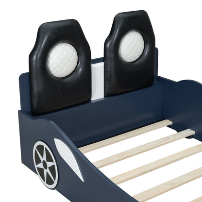 Race car shaped platform bed with two black upholstered backrests, white quilted inserts on Tampa Home & Garden Store
