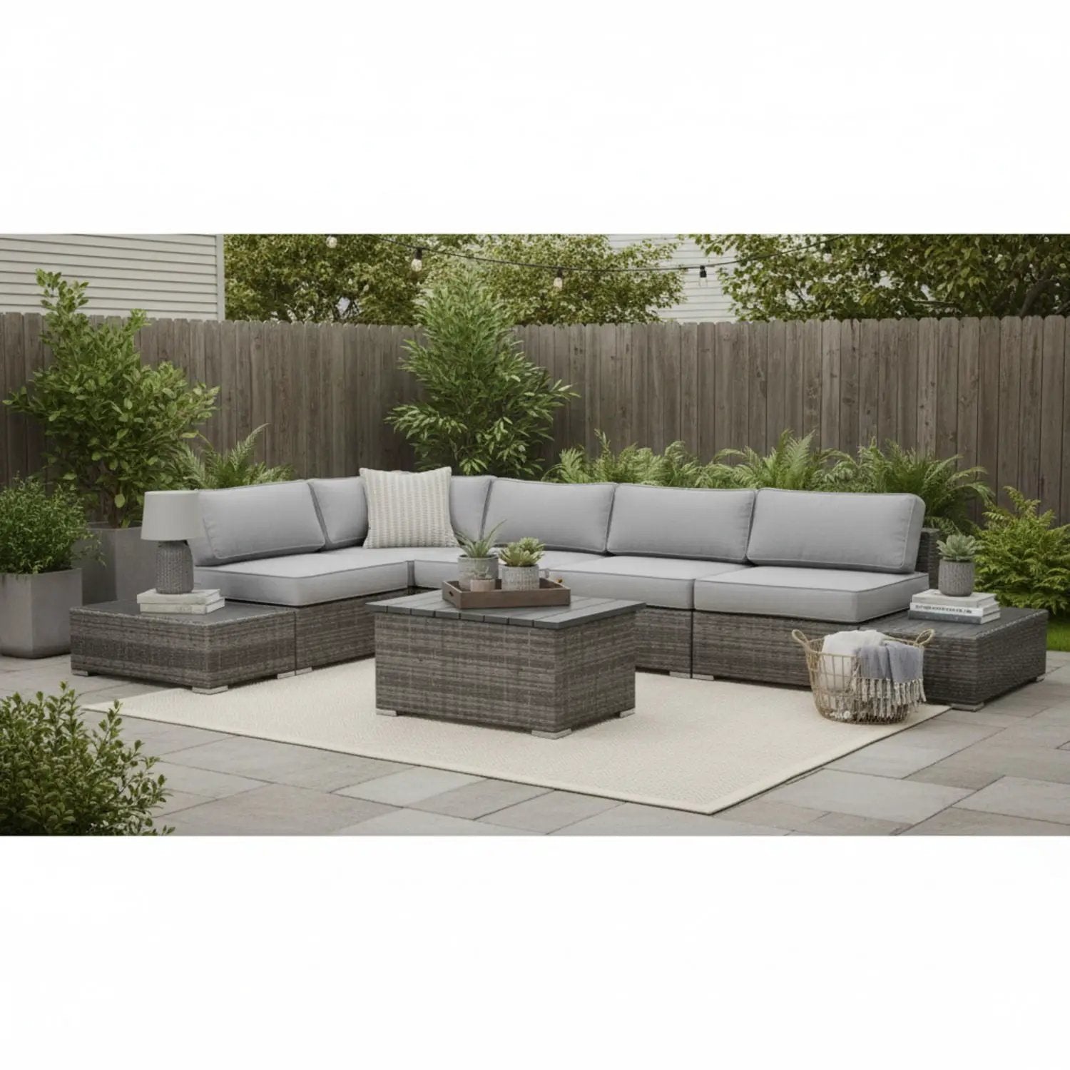 3 Piece Outdoor Sectional Set in gray wicker with light gray cushions on a patio on Tampa Home & Garden Store