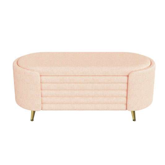 Modern oval storage ottoman with blush pink textured upholstery and gold legs on Tampa Home & Garden Store