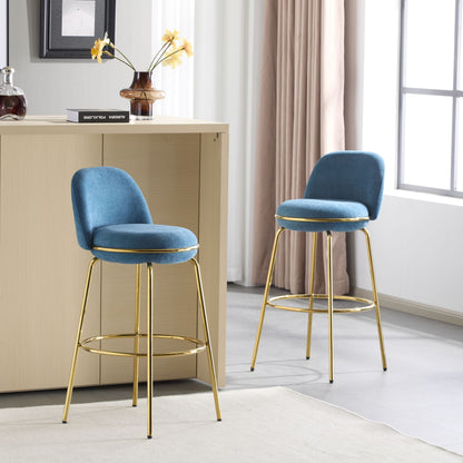 Rio Claro Indoor Upholstered Barstool Set of 2 in blue fabric with gold legs at wood counter on Tampa Home & Garden Store