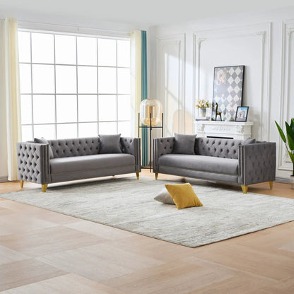Pair of deep-seat gray tufted sofas with button nailhead and square arms, brass legs on Tampa Home & Garden Store
