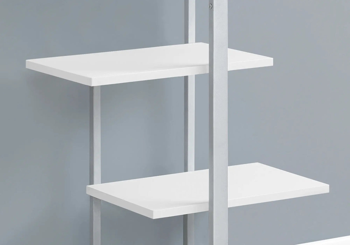White metal etagere bookshelf with slim vertical supports and flat rectangular shelves on Tampa Home & Garden Store