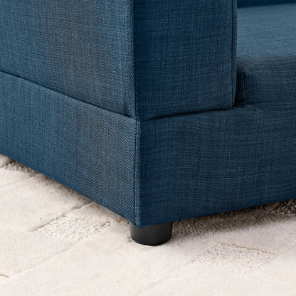 Comfortable oversized pet sofa in navy blue denim fabric with a sturdy black leg on carpet on Tampa Home & Garden Store