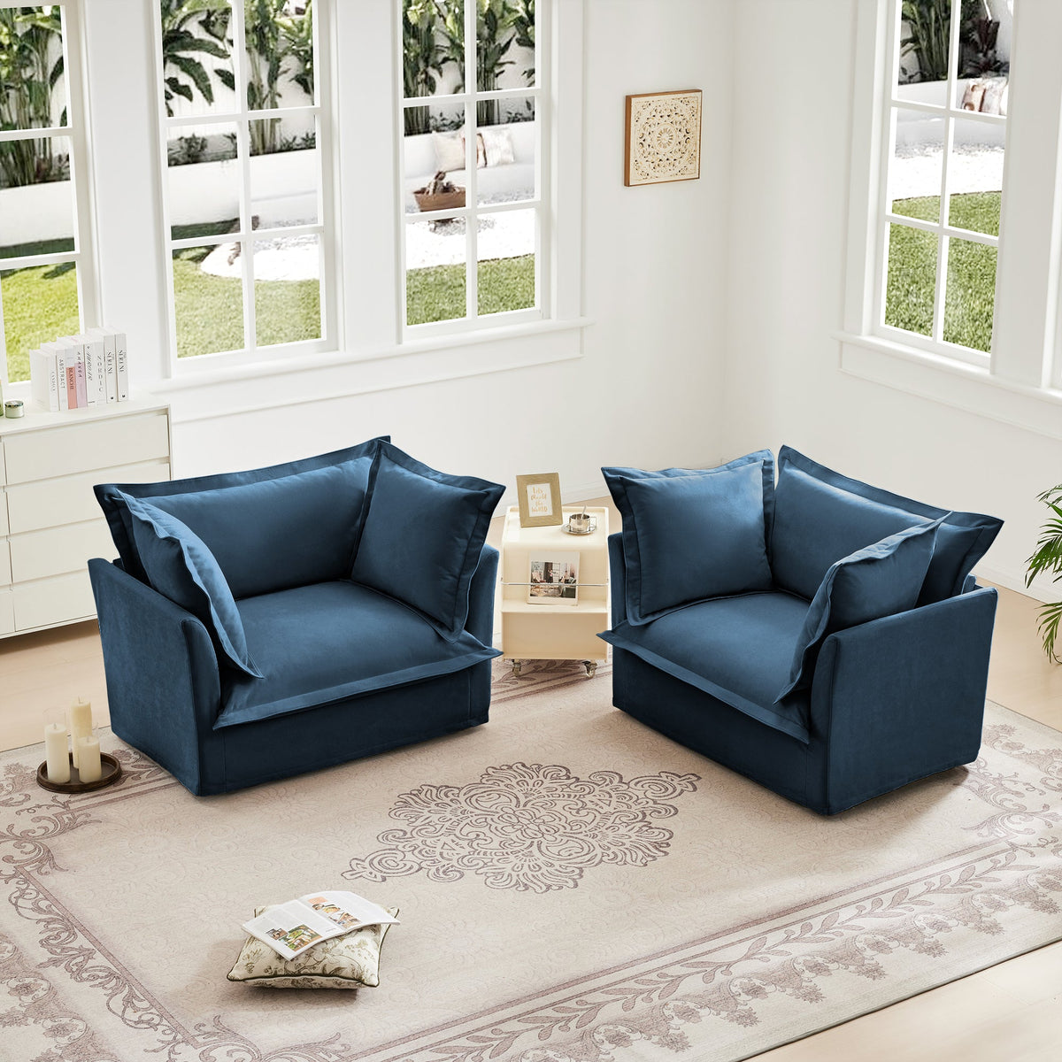 Set of 2 navy blue slipcovered armchairs by HouseOfZazla in a bright sunlit living room on Tampa Home & Garden Store