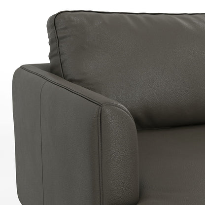 Livingston upholstered sofa dark gray leather close-up of padded armrest with stitched edge on Tampa Home & Garden Store