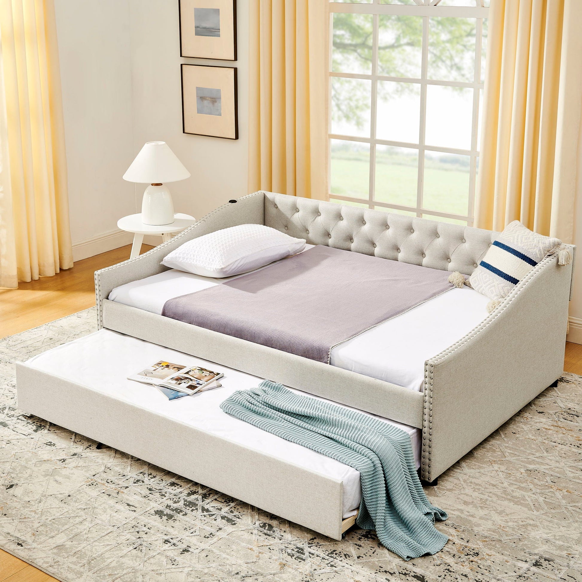 Upholstered daybed by HouseOfZazla with USB charging and pull-out trundle in a bright bedroom on Tampa Home & Garden Store