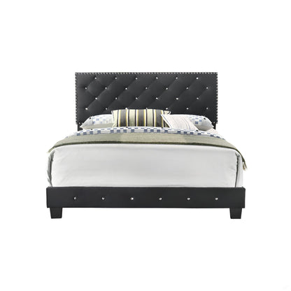 Luxurious upholstered bed with a black tufted faux-leather headboard and nailhead trim on Tampa Home & Garden Store