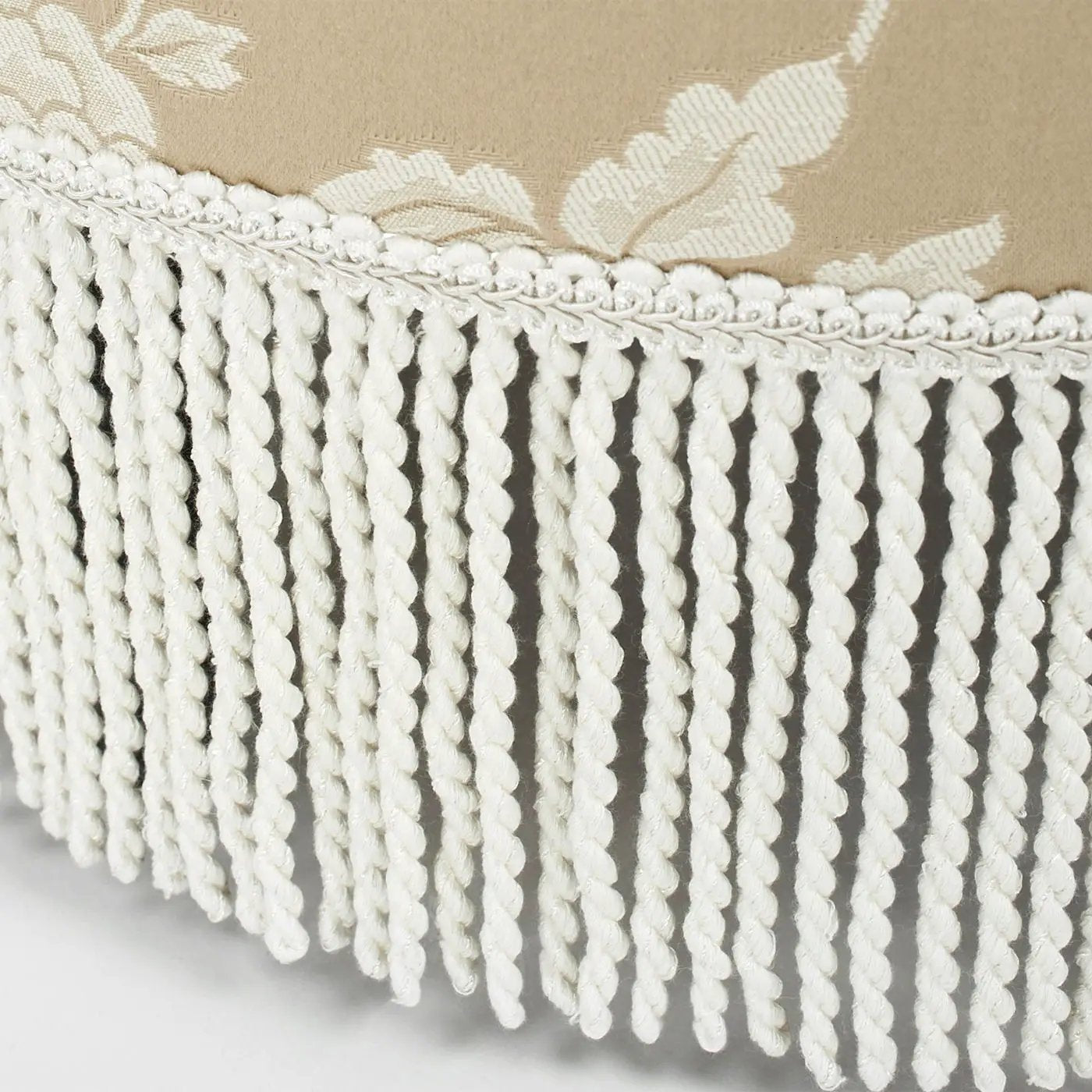 Yolanda upholstered ottoman with tassel fringe on beige fabric by Unique Piece Furniture on Tampa Home & Garden Store