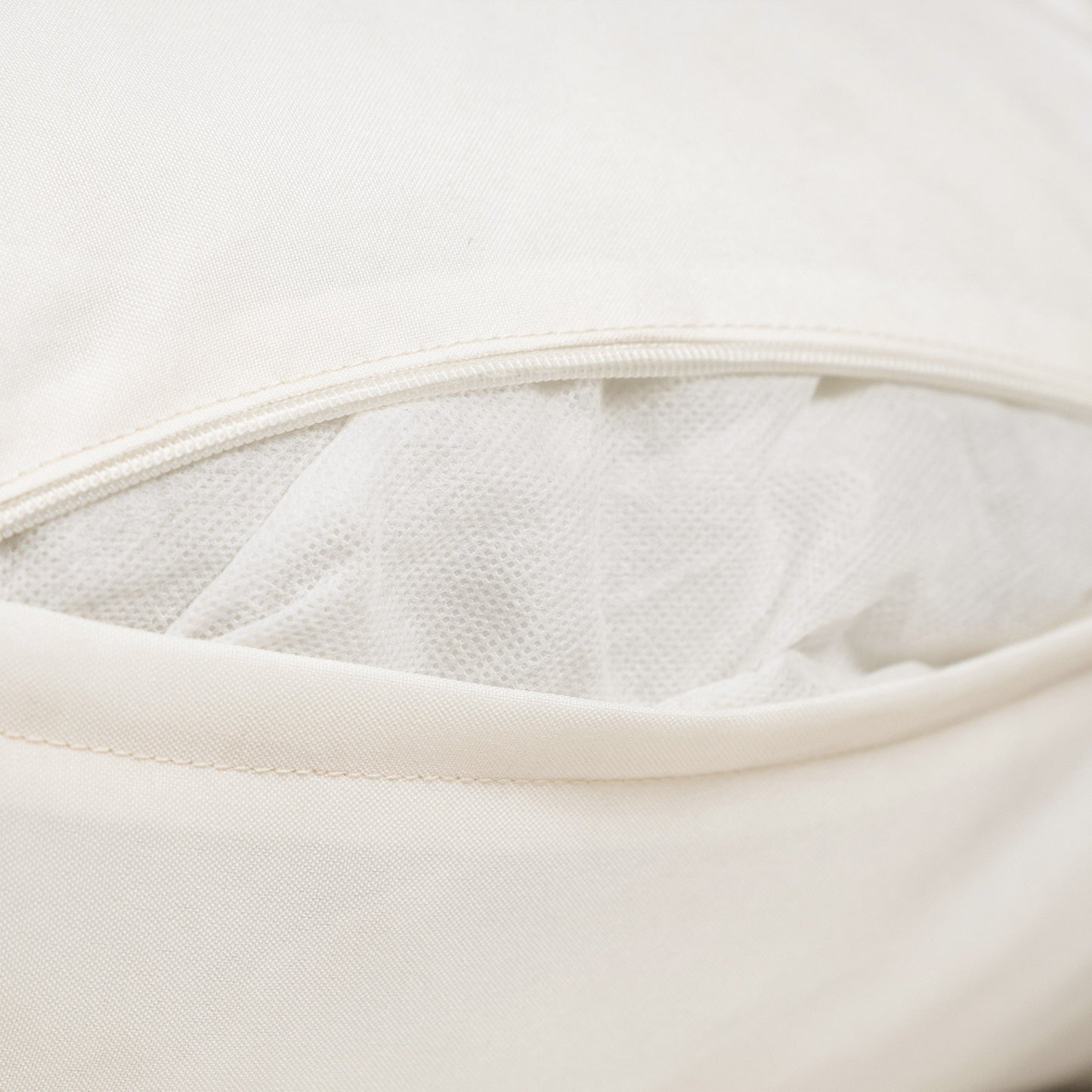 White textured outdoor fabric cushion close-up with stitched seam for modular outdoor seating on Tampa Home & Garden Store