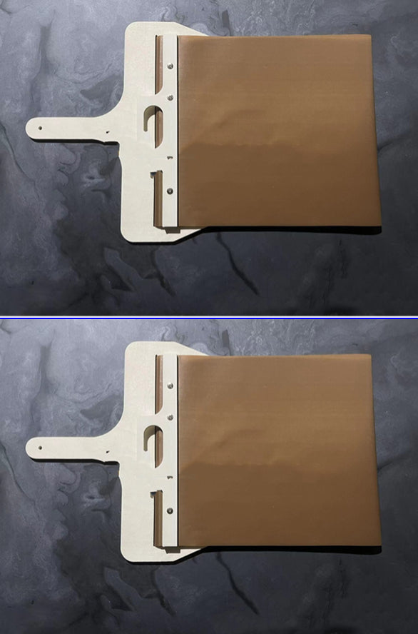 Sliding pizza peel with wooden handle and brown storage board, white frame, and metal rails on Tampa Home & Garden Store