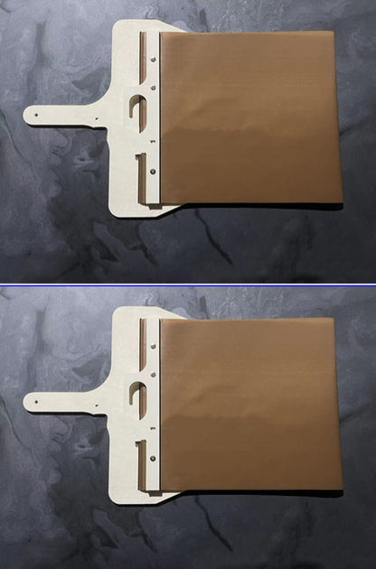 Sliding pizza peel with wooden handle and brown storage board, white frame, and metal rails on Tampa Home & Garden Store