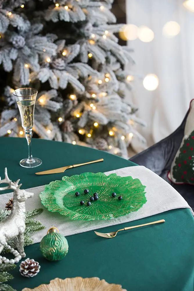Plastic charger plate set of 8 in green leaf-shaped for festive tabletop decor on Tampa Home & Garden Store