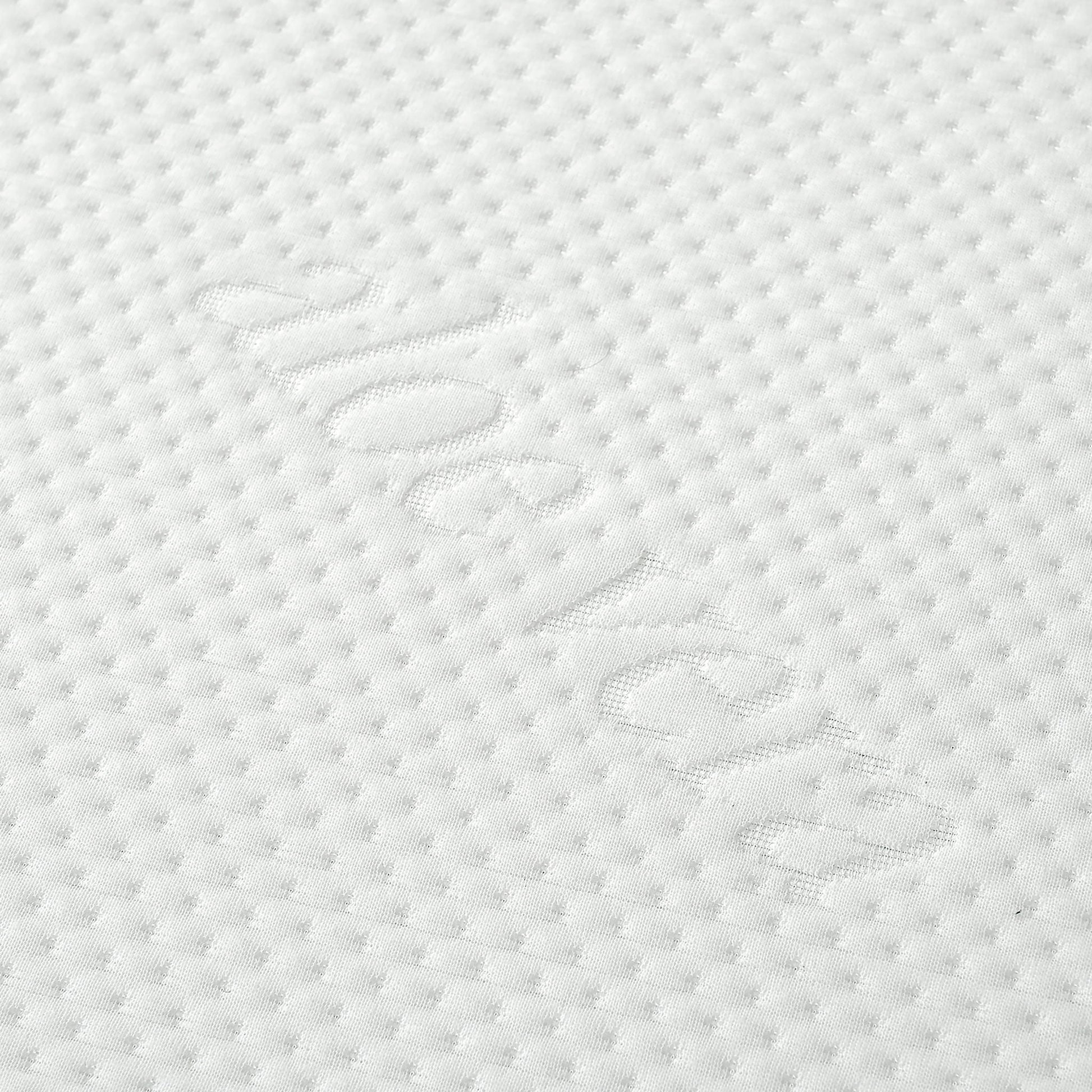 Memory foam mattress fabric close-up in white Aloe Vera cover with dotted quilting texture on Tampa Home & Garden Store