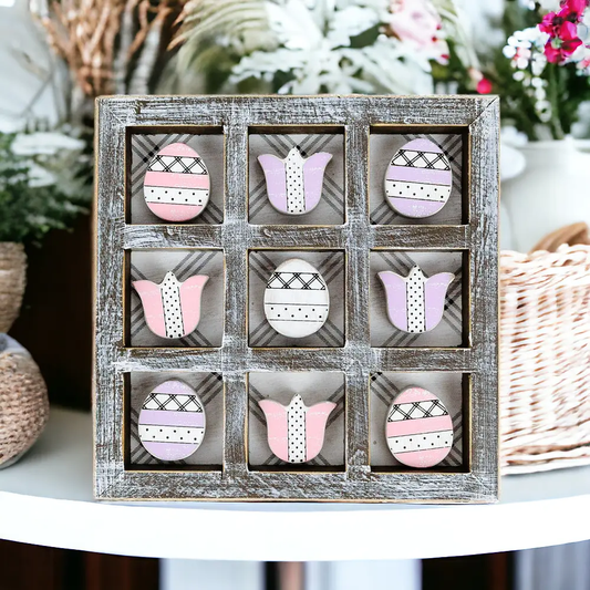 Easter & Spring Tic Tac Toe grid in a distressed wood frame with pastel egg and tulip tiles on Tampa Home & Garden Store