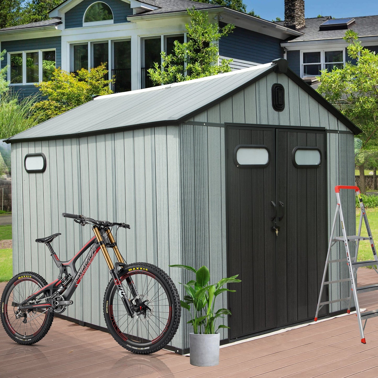 8x10ft outdoor resin storage shed in gray with black trim and double doors with windows on Tampa Home & Garden Store