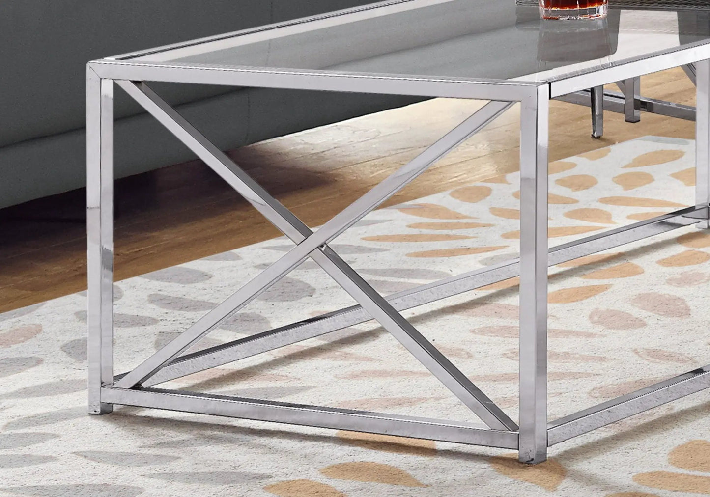 Rectangular chrome coffee table with glass top and cross-brace legs, Unique Piece Furniture on Tampa Home & Garden Store