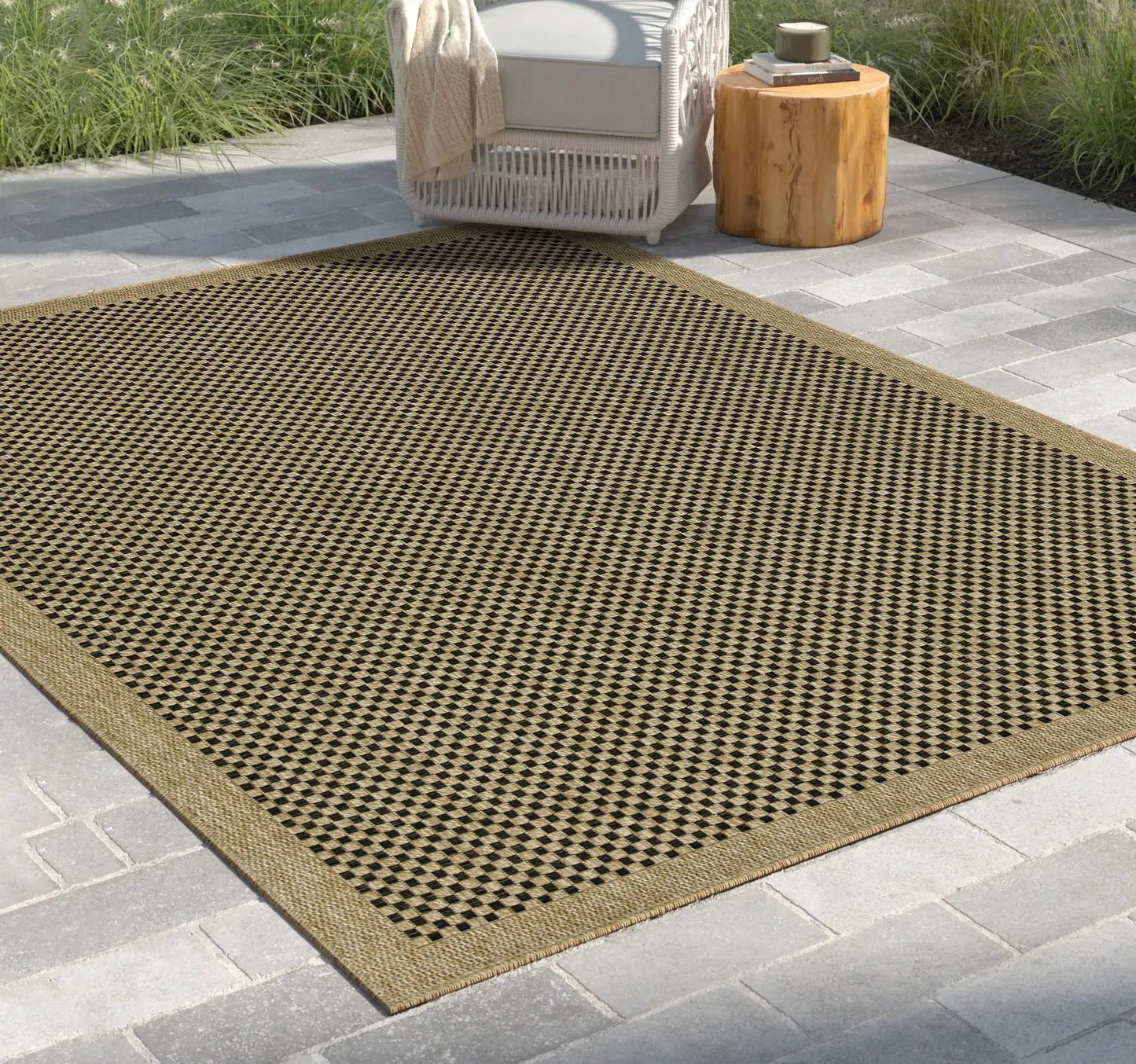 Earth indoor/outdoor area rug black checkerboard pattern with natural border polypropylene/jute on Tampa Home & Garden Store