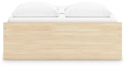 Onita platform bed in natural wood with white bedding on Tampa Home & Garden Store