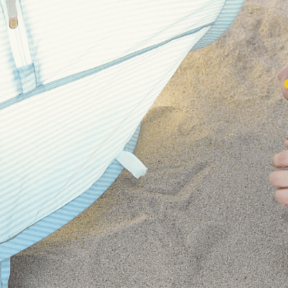 Tiny Land One-Stop Beach Toy & Tent Set beach tent with blue striped fabric, pop-up style on sand on Tampa Home & Garden Store