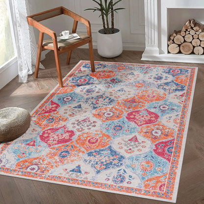 Maval area rug by Unique Piece Furniture in orange blue and teal with medallion border on wood floor on Tampa Home & Garden Store