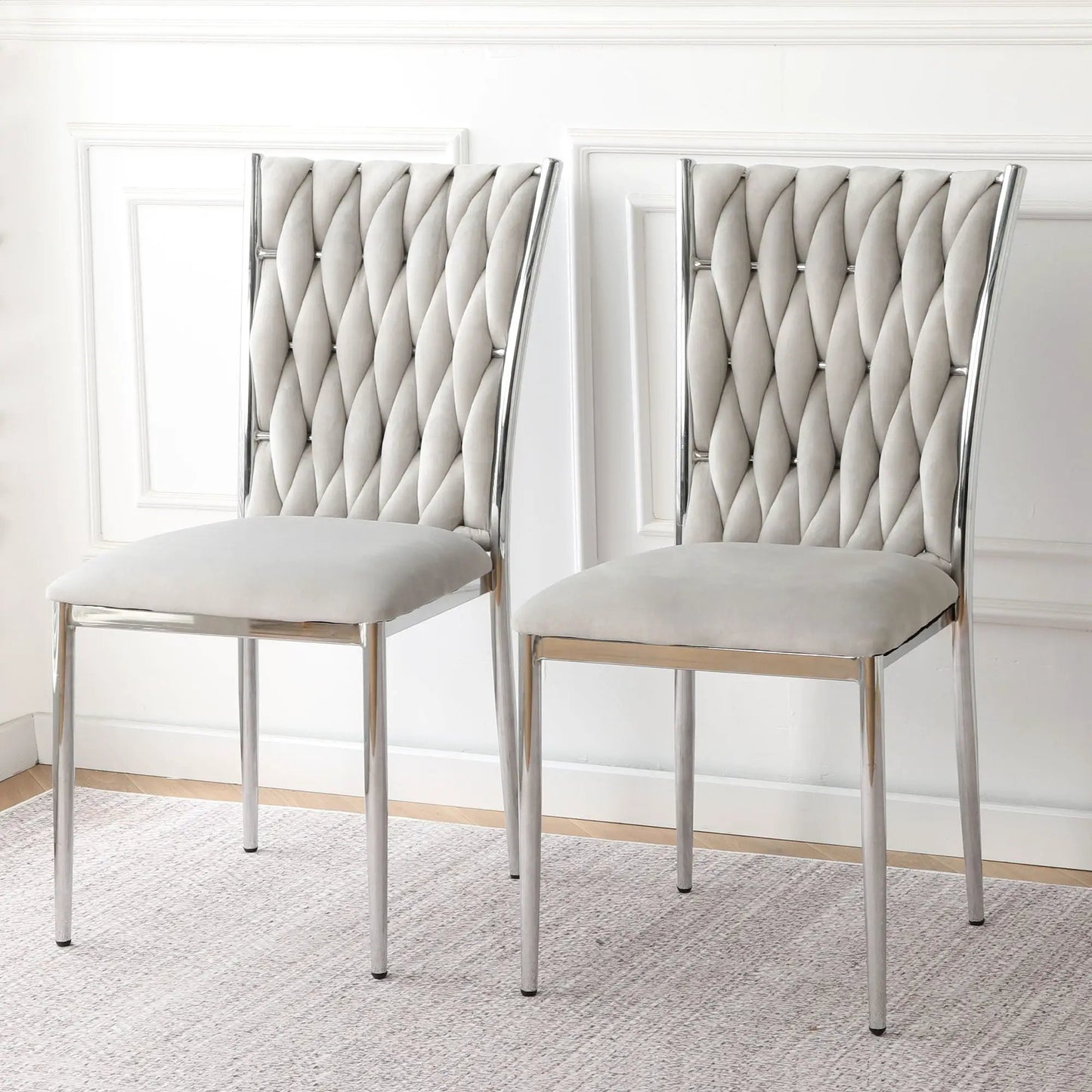 Pair of Modern Dining Chairs with tufted gray velvet upholstery and chrome frames on Tampa Home & Garden Store