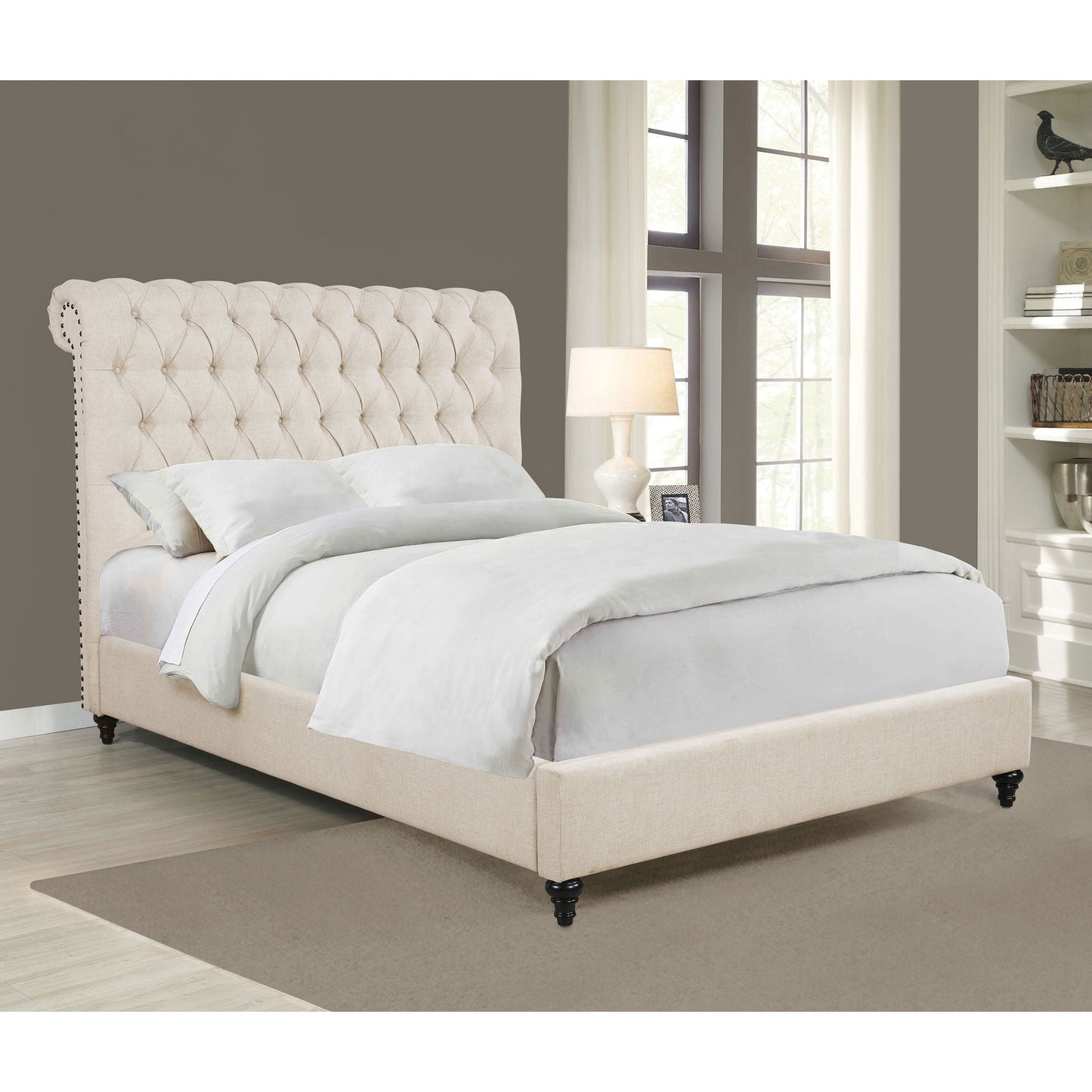 Clemence tufted upholstered bed by HouseOfZazla in beige fabric with rolled headboard on Tampa Home & Garden Store