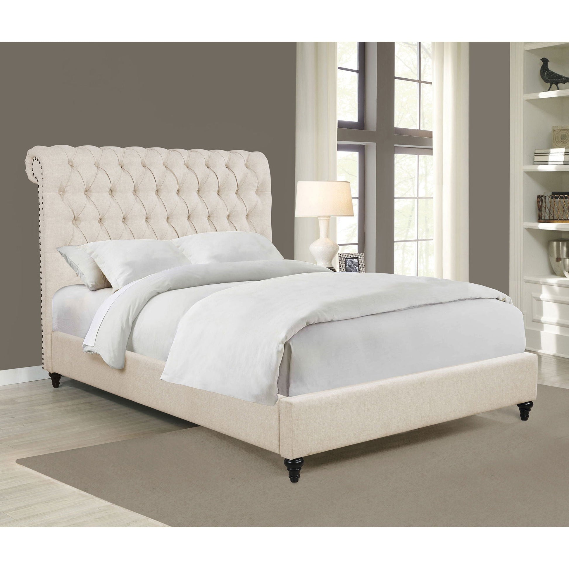 Clemence tufted upholstered bed by HouseOfZazla in beige fabric with rolled headboard on Tampa Home & Garden Store