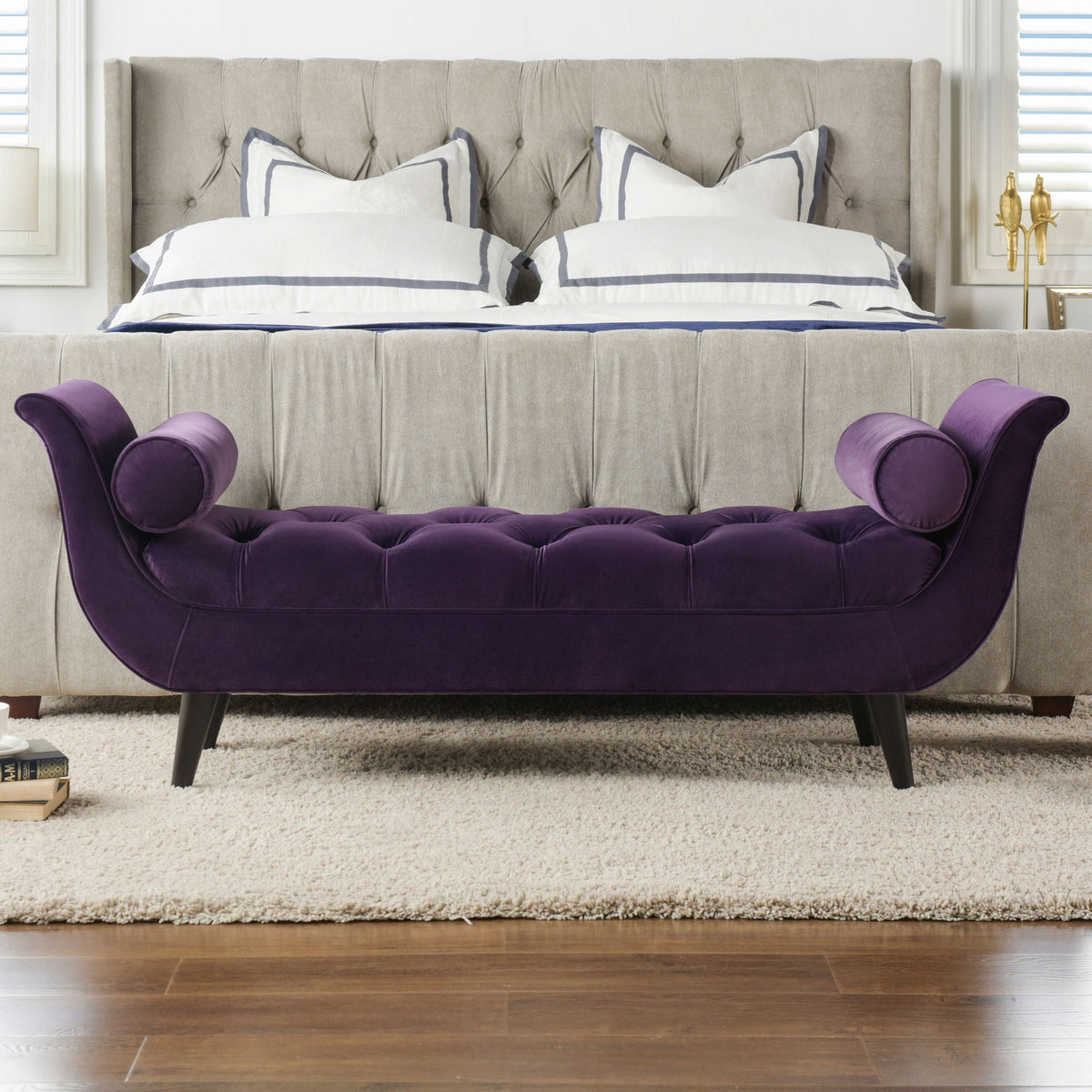 Tufted flared-arm entryway bench in purple velvet with curved arms and dark legs on Tampa Home & Garden Store