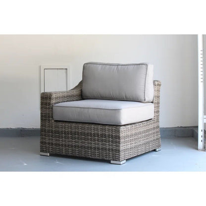 Chic wide outdoor loveseat with light gray cushions and woven wicker frame on Tampa Home & Garden Store