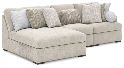 Cuddle Plush Sectional sofa in beige plush fabric with textured gray pillows on Tampa Home & Garden Store