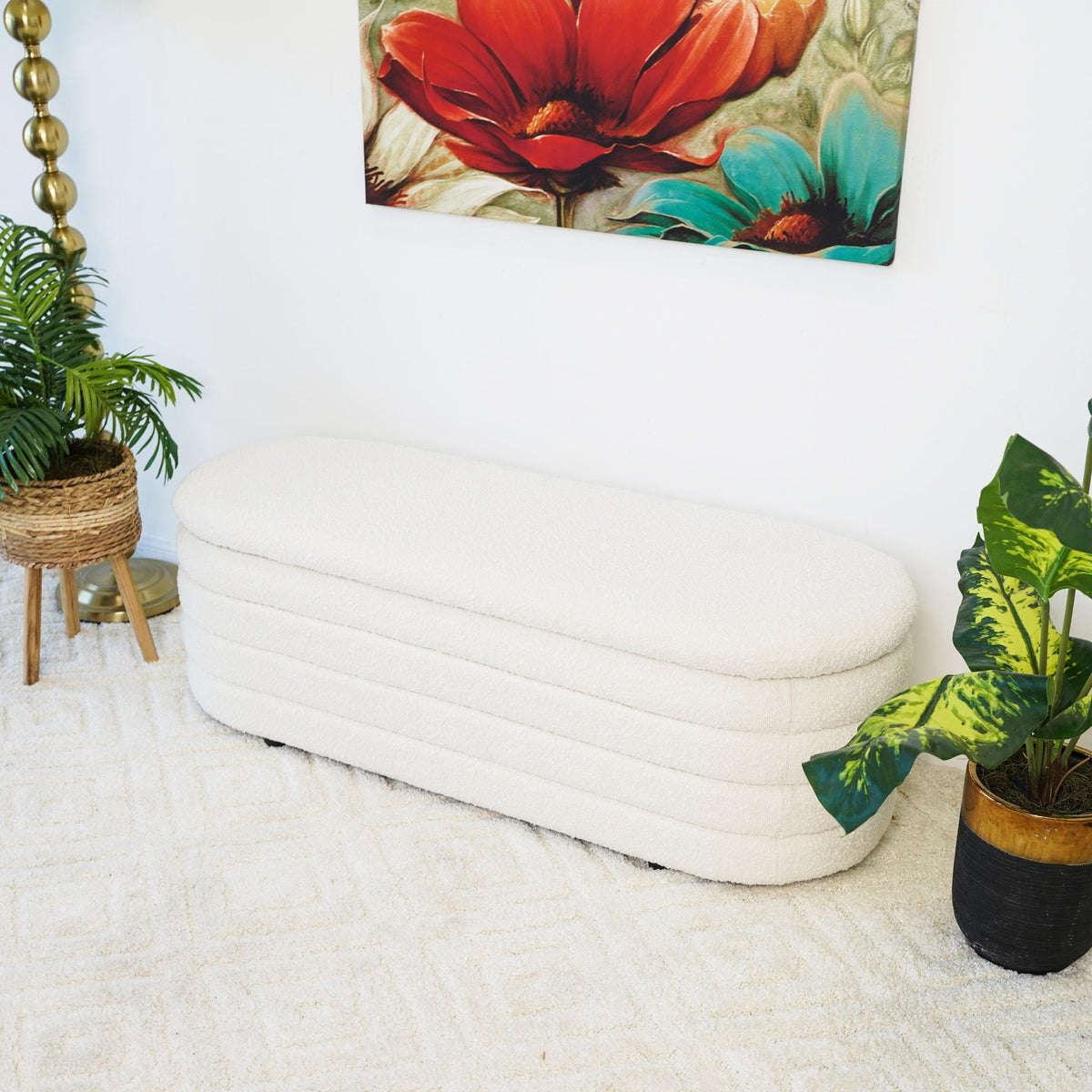 Cabana ivory storage bench with curved, cushioned upholstery in a living room on Tampa Home & Garden Store
