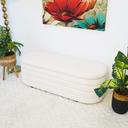 Cabana ivory storage bench with curved, cushioned upholstery in a living room on Tampa Home & Garden Store