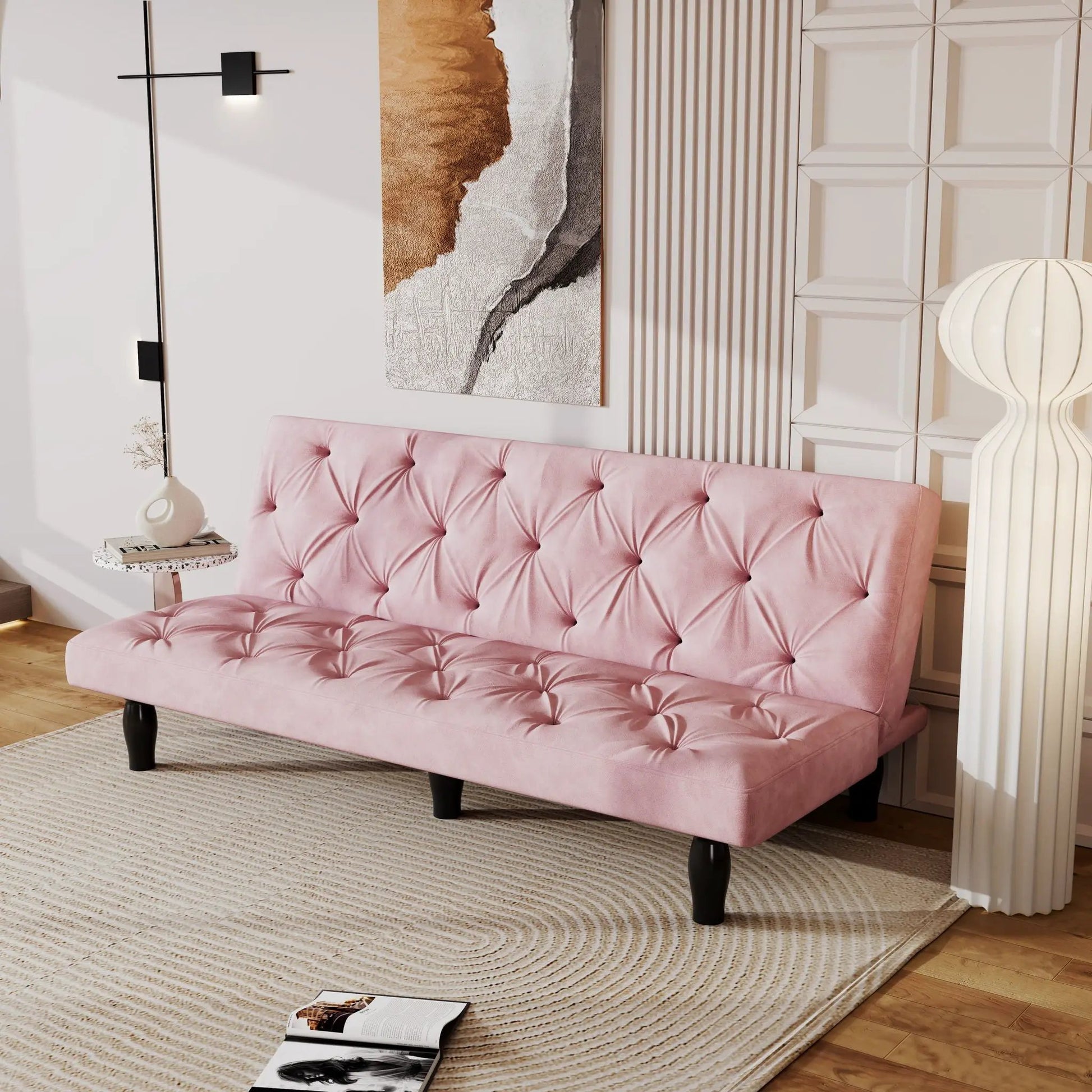 Sofa Bed With Adjustable Backrest in pink tufted fabric with black legs in a modern living room on Tampa Home & Garden Store