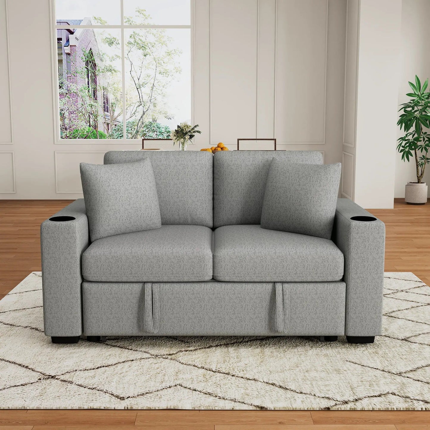 Modern grey fabric 2-seat sleeper loveseat with cup holders in armrests on Tampa Home & Garden Store
