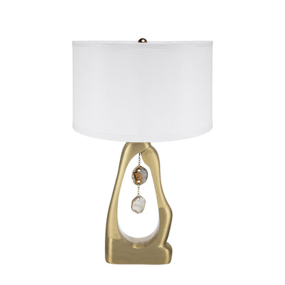 Geode-Inspired gold aluminum table lamp with white fabric shade and hanging crystals on Tampa Home & Garden Store