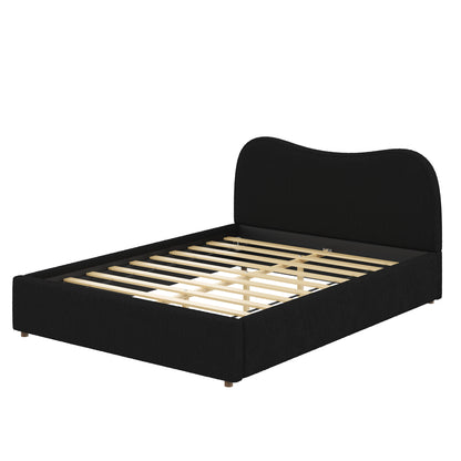 Queen size upholstered platform bed in black fabric with visible wooden slats on Tampa Home & Garden Store