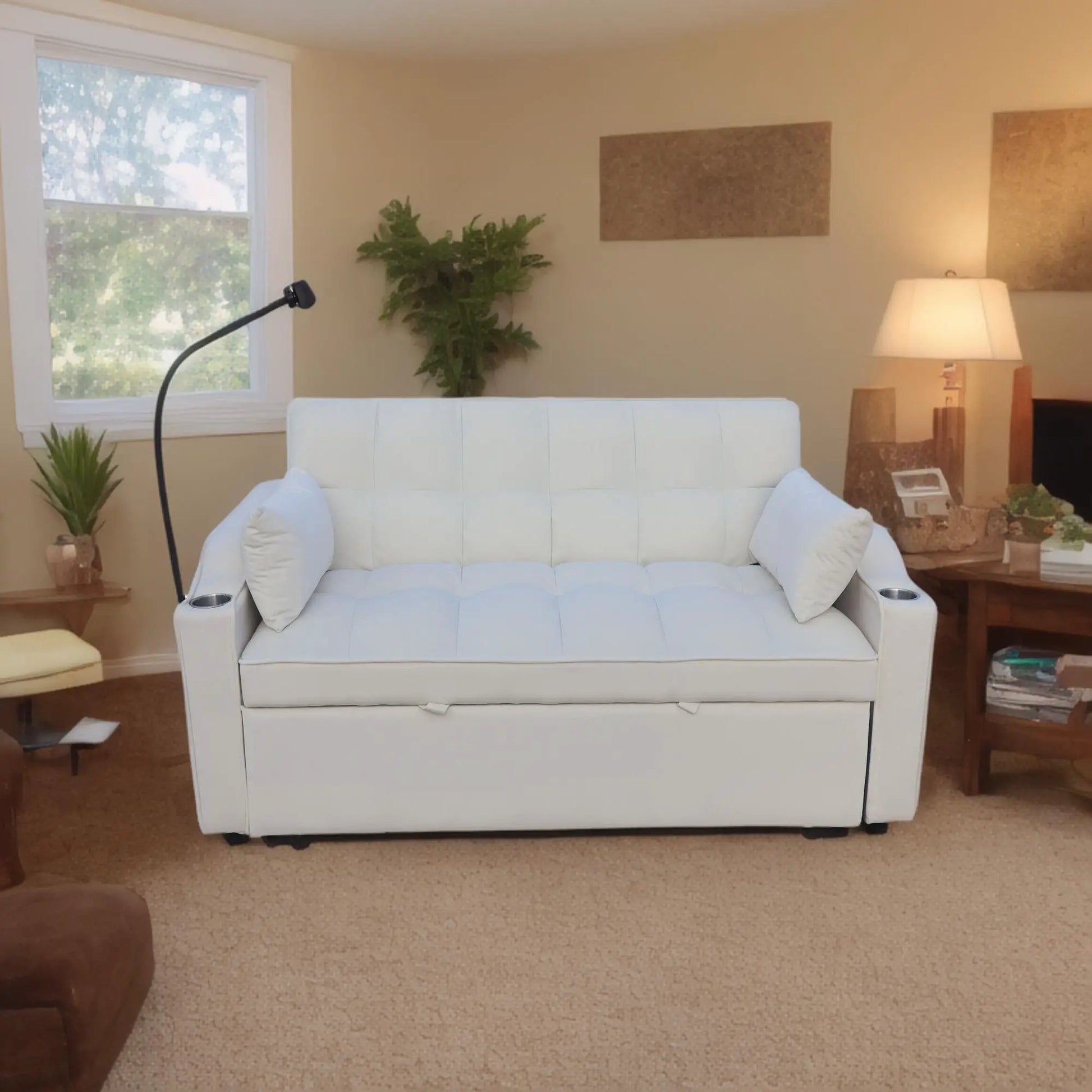 Modern white sleeper loveseat futon with adjustable backrest and toss pillows in living room on Tampa Home & Garden Store