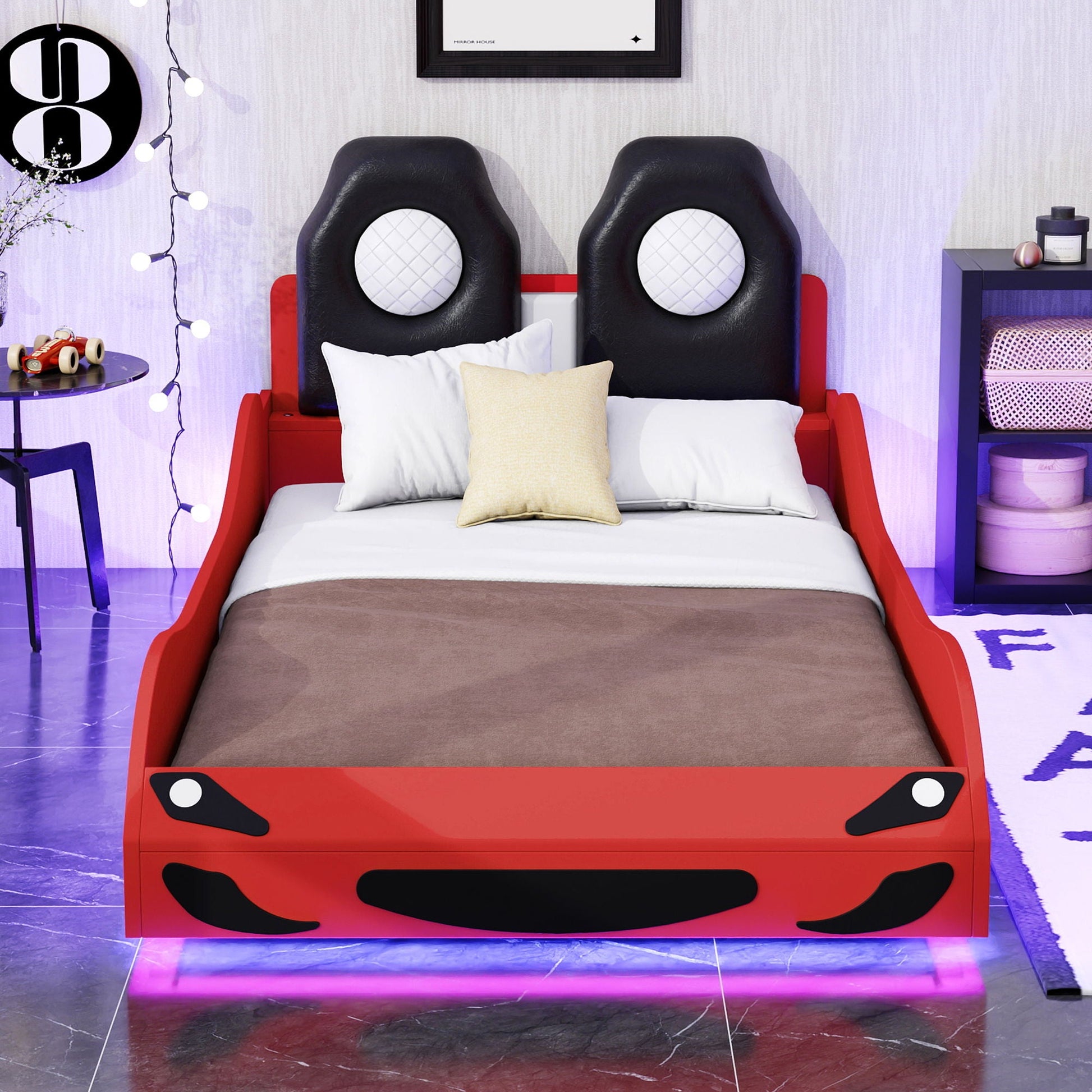 Race car bed with LED lights, red frame black upholstered backrests with white discs on Tampa Home & Garden Store