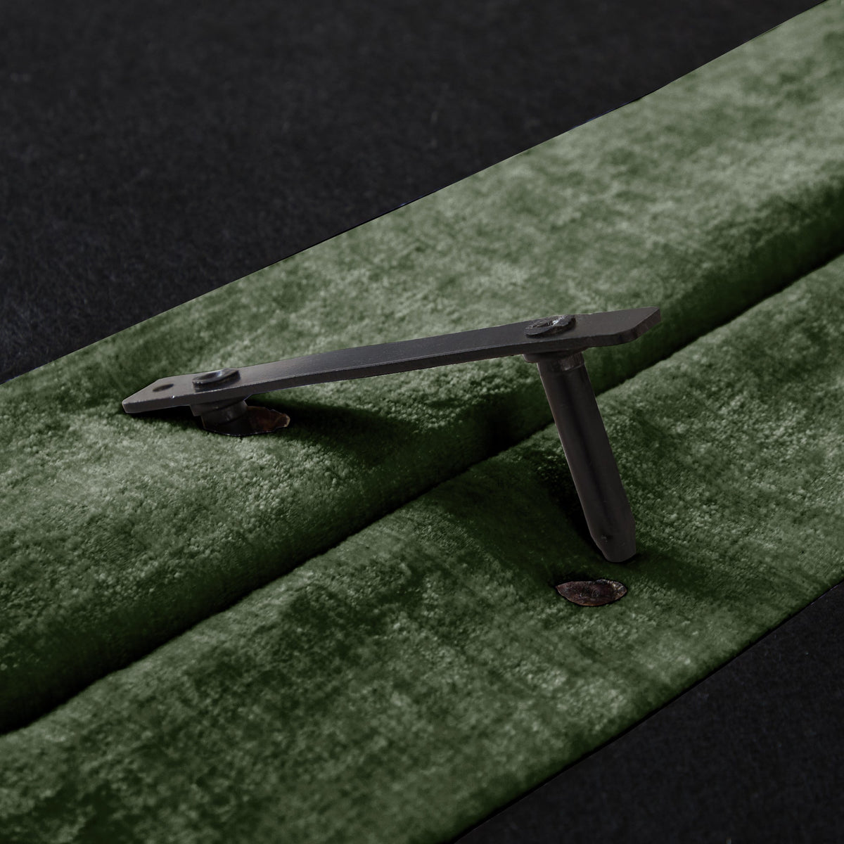 U-Shaped Sectional Sofa footrest hinge in dark metal, close-up with bolts HouseOfZazla on Tampa Home & Garden Store