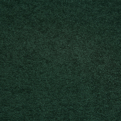 Close-up of dark emerald green carpet fibers with textured pile on Tampa Home & Garden Store