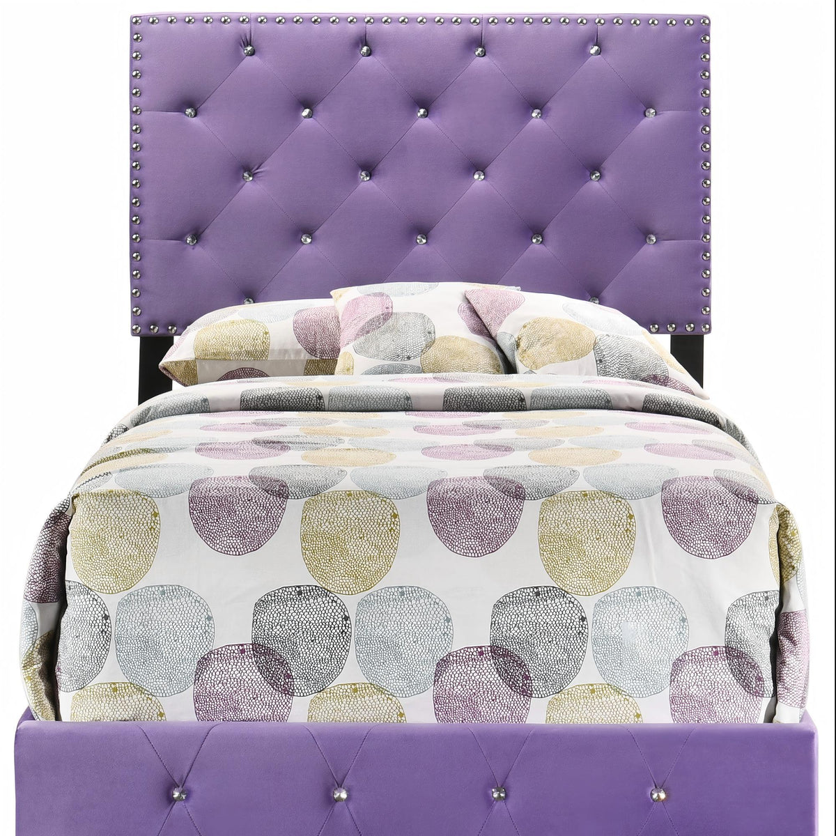 Luxurious upholstered bed in purple with tufted headboard and crystal studded edges on Tampa Home & Garden Store