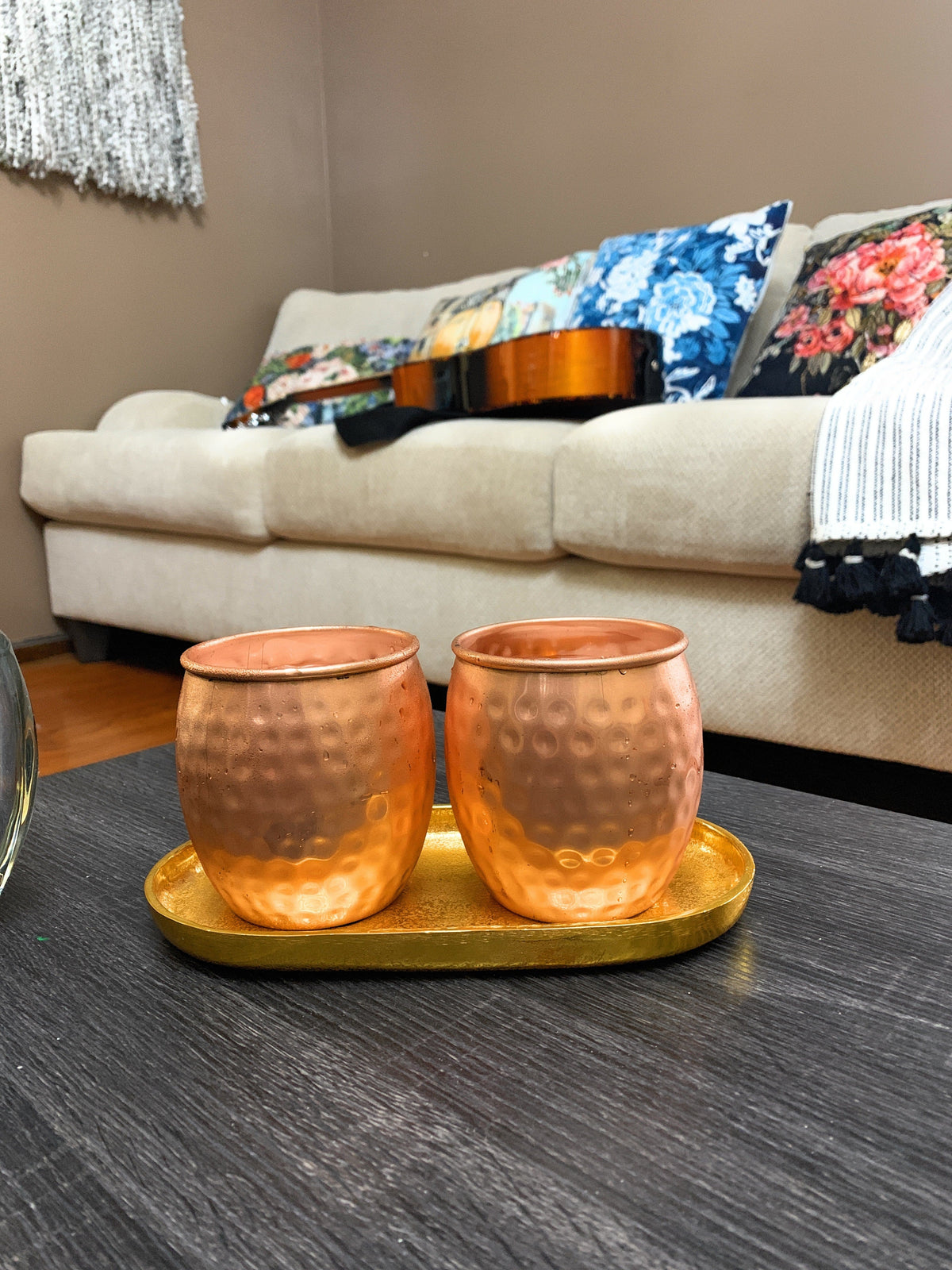 Vibhsa hammered Moscow Mule mugs, copper finish, set of 2 on a gold tray on Tampa Home & Garden Store