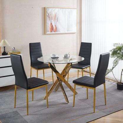 Elegant Legs Dining Chair set of 4 black faux-leather seats with gold legs around a glass dining table on Tampa Home & Garden Store