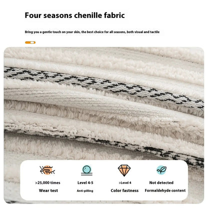 Cream four-season chenille sofa cover with a black woven stripe, folded fabric stack on Tampa Home & Garden Store