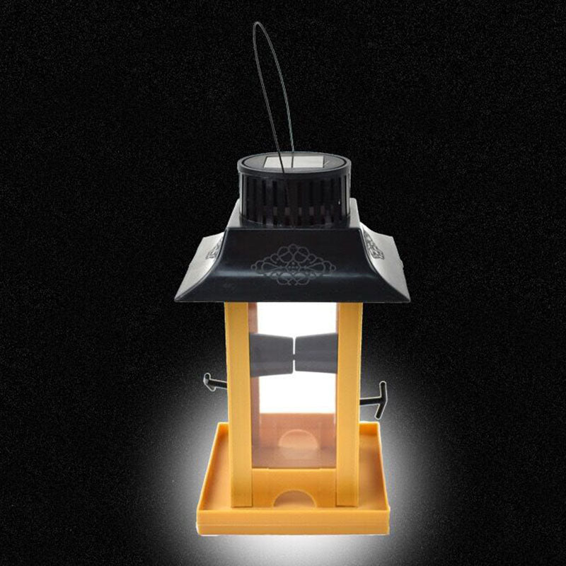Hook-type solar lamp bird feeder with yellow wooden frame, black roof, and hanging hook on Tampa Home & Garden Store