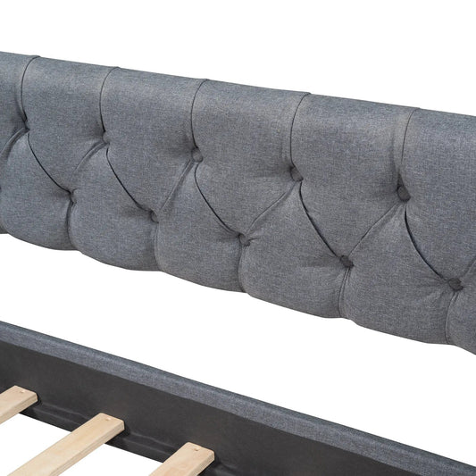 Upholstered gray twin daybed with tufted cushions and exposed wooden slat base on Tampa Home & Garden Store
