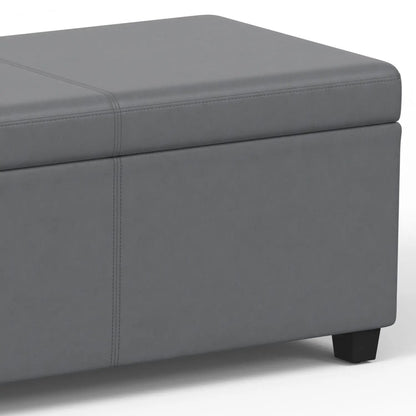 Avalon Storage Ottoman Bench, gray upholstery with stitched seams and dark square legs on Tampa Home & Garden Store