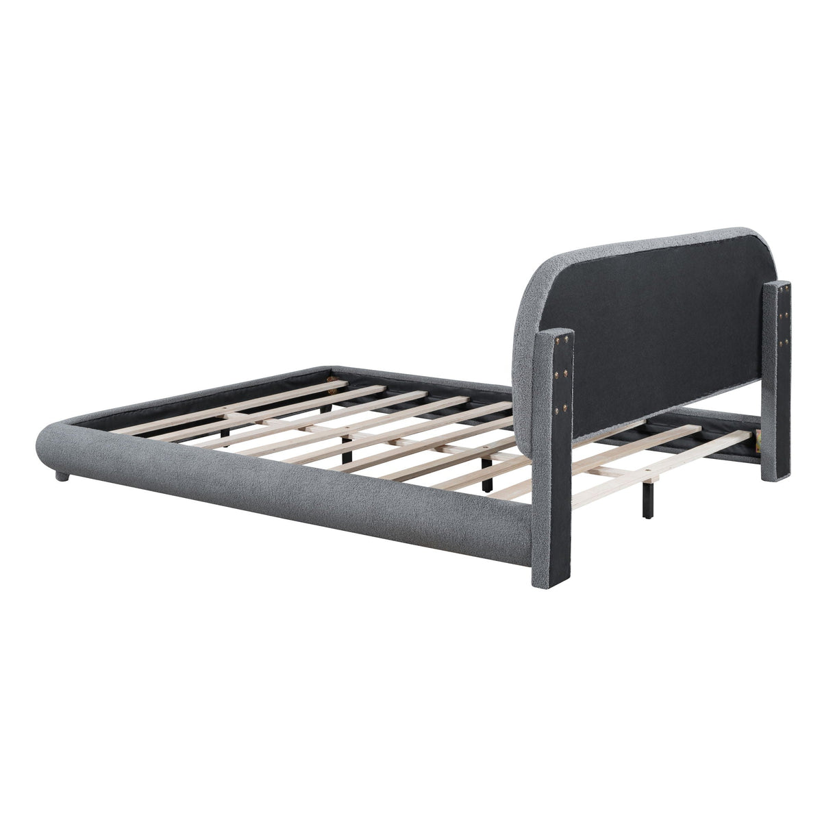 Upholstered platform bed by HouseOfZazla with thick grey frame and curved headboard on Tampa Home & Garden Store